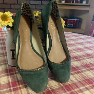 Green suede flats with gold trim
